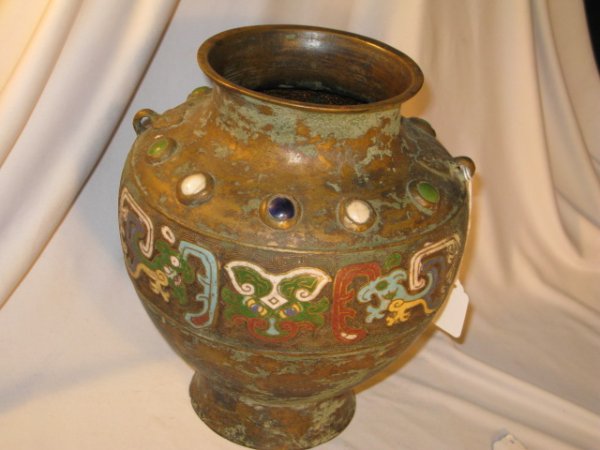 VINTAGE CHAMPLEVE VASE W/JEWELS: VINTAGE CHAMPLEVE VASE W/ROUND STONES. THE VASE HAS ENAMELED DECORATION, A VERDE GRIS PATINA AND ROUND STONES INSET INTO SMALL SPHERES. THERE ARE TWO LOOPS ON EACH SIDE OF THE VASE. A VERY OLD LOOK. A