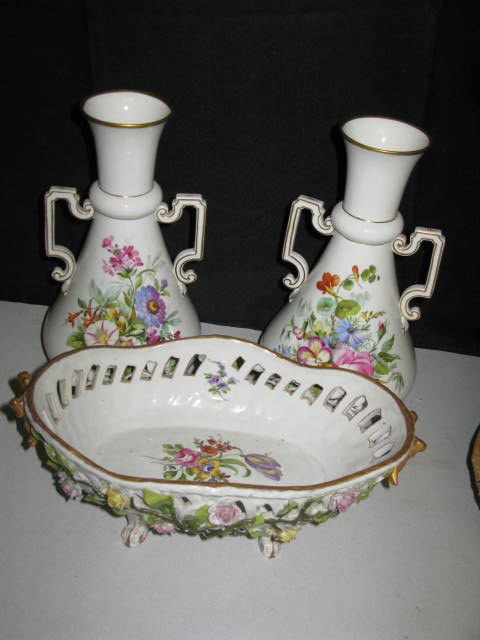 PR. KPM VASES & RETICULATED BOWL: PR. KPM VASES W/FLOWERS & RETICULATED BOWL. FLORAL & VINE DECORATION W/NEOCLASSICAL DOUBLE HANDLES. THE VASES HAVE 3 "KPM" MARKS. (APP. 10"H x 6"W @ BASE). THE OVAL FOOTEE BOWL HAS APPLIED FOOWERS & V