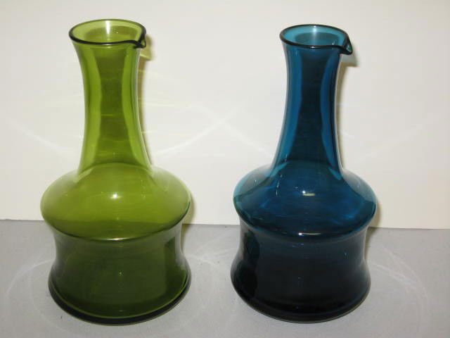 2 BERTIL VALLIEN WINE DECANTERS: 2 BERTIL VALLIEN WINE DECANTERS. ONE IS SEA GREEN AND ONE IS DEEP BLUE. APP. 9"H. VGC.