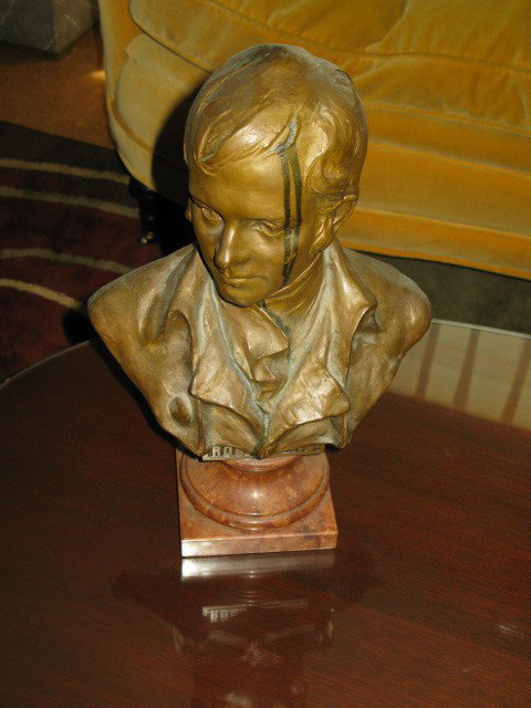 BRONZE BUST, ROBERT BURNS. ON MARBLE PLINTH: BRONZE BUST, ROBERT BURNS, ON MARBLE PLINTH. THERE IS AN OXIDATION DRIP ON ONE SIDE OF HEAD. APP. 14.5"H X 9.5"W.