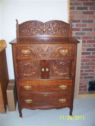OAK FANCY DOUBLE BONNET CHEST, HEAVILY CARVED