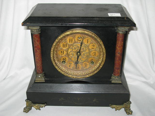 SESSIONS MANTLE CLOCK, PAPER FACE, WOOD CASE: SESSIONS MANTLE CLOCK, PAPER FACE, HALF-COLUMNS, BLACK WOODEN CASE. NOT IN WORKING ORDER.