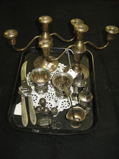 STERLING LOT INCL. 3-CANDLE CANDELABRA: STERLING LOT WHICH INCLUDES PR. 3-CANDLE CANDELABRA, 2 STERLING TOOTHPICK HOLDERS IN THE SHAPE OF URNS; 4 TINY S&P, PLATED CHICKEN BONE CUTTER, TEA STRAINER, MINI HOTEL SENECA CREAMER. VGC