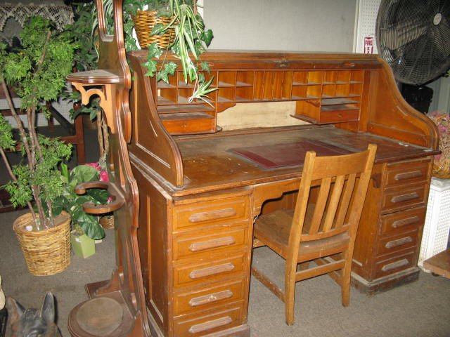 OAK ROLLTOP DESK, C-SCROLL: OAK ROLLTOP DESK, C-SCROLL, LG. & HEAVY W OAK CHAIR. 49"H, 58 1/2"L .