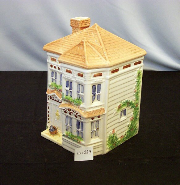 AVON HOUSE COOKIE JAR: AVON HOUSE COOKIE JAR. Labeled "Avon Townhouse Canister Collection." App 6"L x 6"W x 9 1/2"H