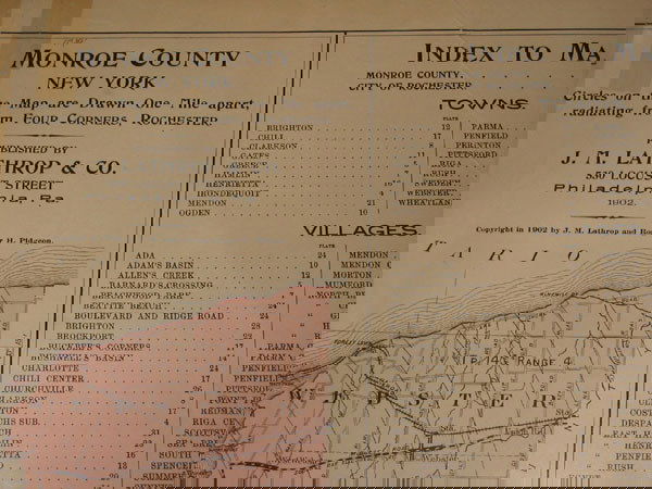 1902 PLAT BOOK MONROE CO. NY MAPS LATHROP.: 1902 PLAT BOOK MONROE CO. NY MAPS LATHROP. 32 HAND COLORED PLATES INCL. HISTORY AND BUSINESS DIRECTORY. PUBLISHED BY J. M. LATHROP & CO, PHIL. 1902. REBOUND ORIG. PGS. IN NEW GREEN CLOTH HARD COVER BD