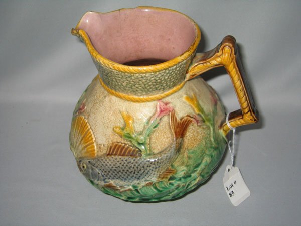 MAJOLICA PITCHER, FISH DESIGN: MAJOLICA PITCHER, FISH DESIGN. APP 7.5" H. SEVERAL CHIPS ON RIM