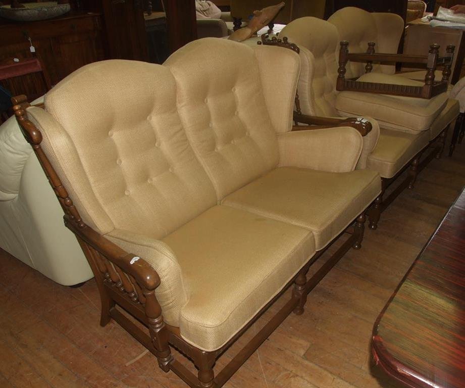 A pair of Ercol two seater settees, with a matching: A pair of Ercol two seater settees, with a matching footstool (3)