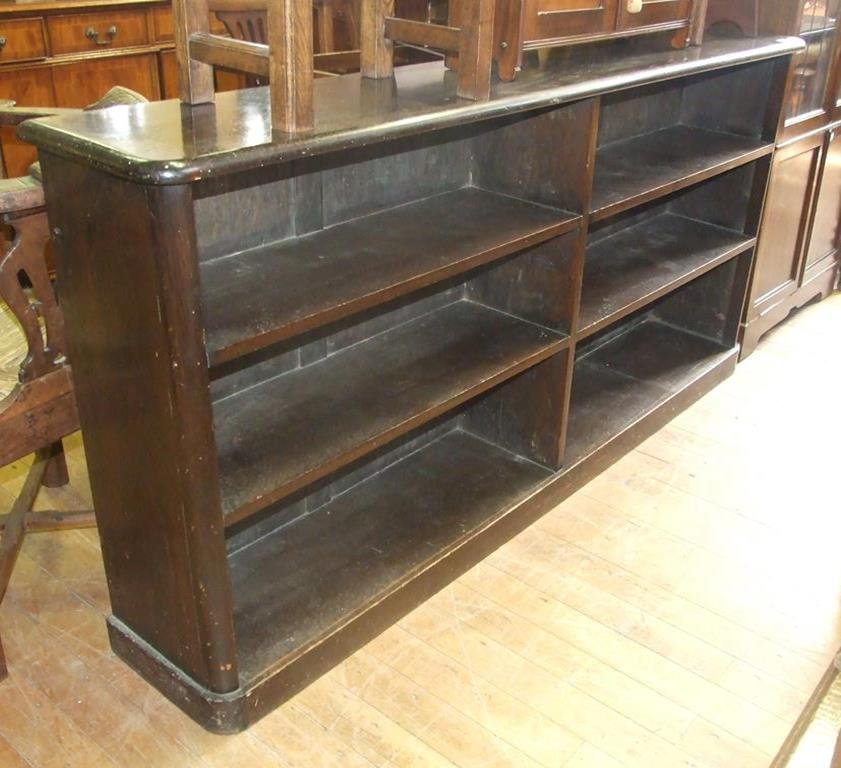 An Ercol style bookcase, 182 cm wide, and an oak: An Ercol style bookcase, 182 cm wide, and an oak bookcase (2)