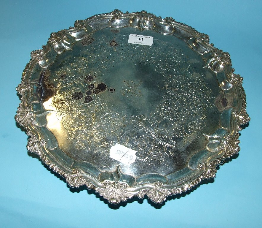 A Victorian silver salver, initialled, the reverse with: A Victorian silver salver, initialled, the reverse with a presentation inscription and dated 1850, London 1849, approx. 27.625 ozt, 31.5 cm diameter