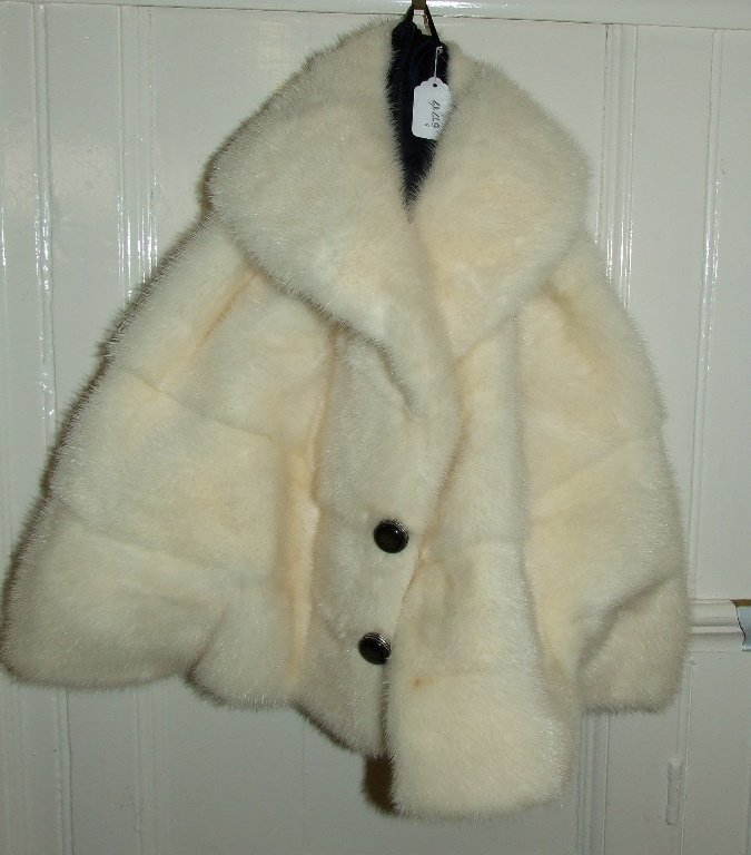 A white mink bolero jacket: A white mink bolero jacket