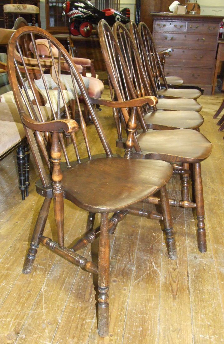A set of six Ercol style beech and elm hoop back chairs: A set of six Ercol style beech and elm hoop back chairs (4+2) (6)