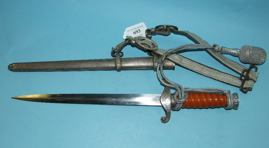 A German officer's style dagger, the blade signed F W: A German officer's style dagger, the blade signed F W Holler, with a hanger and a knot See general disclaimer on Third Reich items ‘Please note that, owing to the large number of reproduction Third 