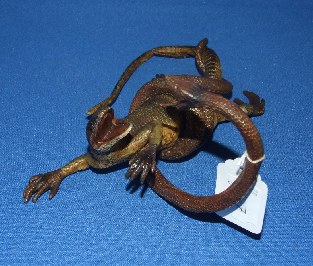 A cold painted bronze group, of a snake and a lizard,: A cold painted bronze group, of a snake and a lizard, 10 cm high