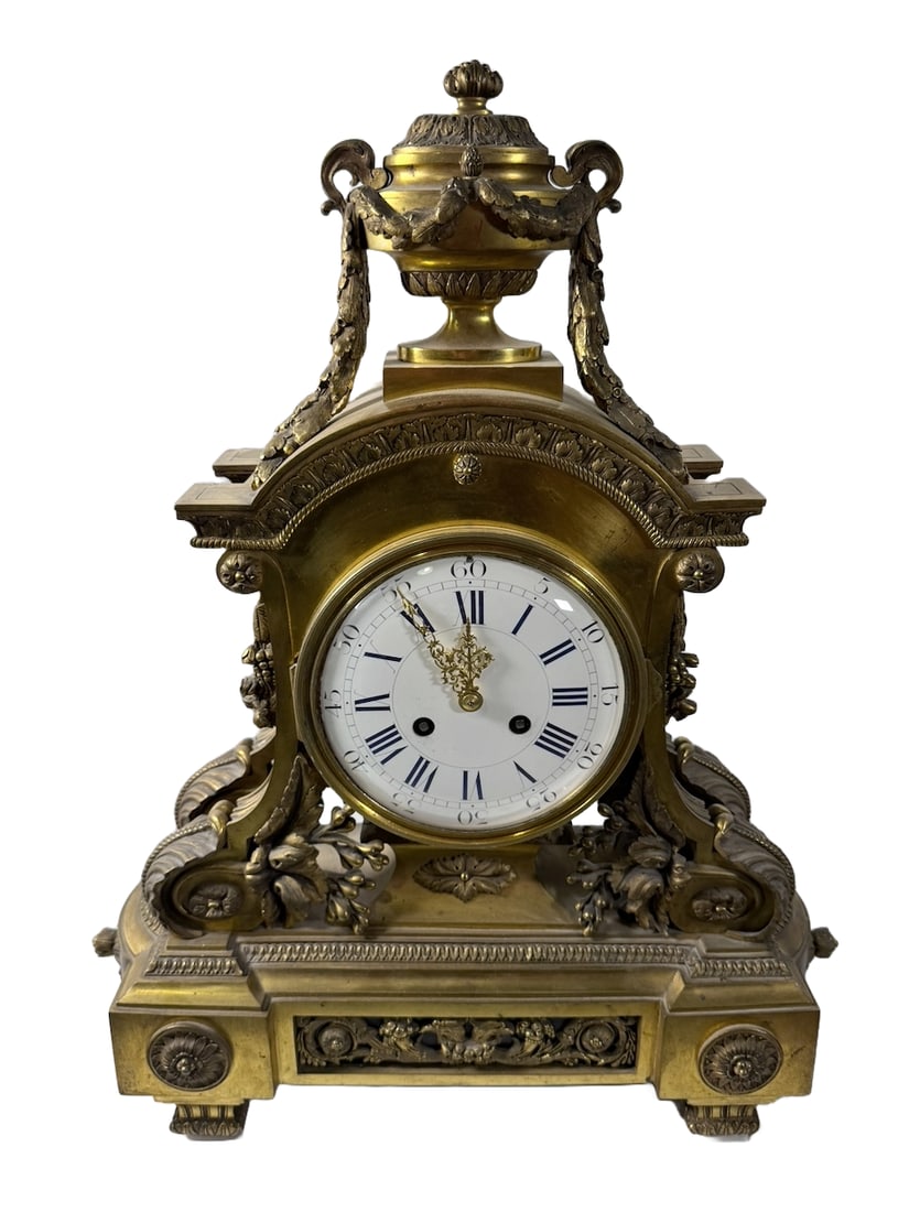 French Gilt Bronze (Ormolu) Mantel Clock, 19th Century, Classical Revival: Impressive French gilt bronze (ormolu) mantel clock, likely dating to the mid–late 19th century, executed in a richly modeled Classical Revival style. The architectural case is adorned with finely c