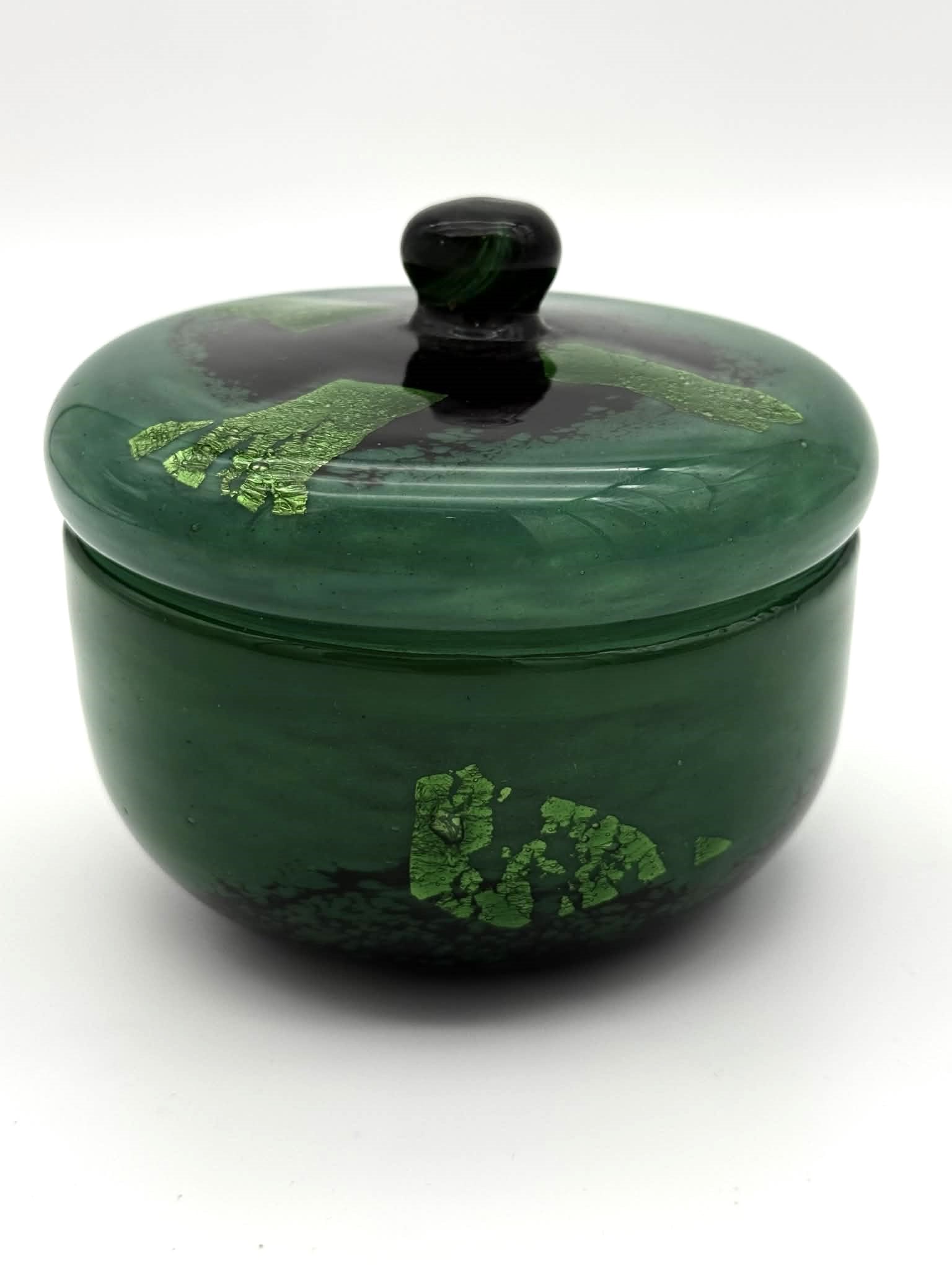 Daum Nancy French Art Glass Covered Box – Wheel-Carved Signature with Gold Leaf Inclusions: An exceptional Daum Nancy French art glass covered box, richly executed in deep emerald green with layered color transitions and brilliant gold leaf inclusions suspended within the glass. The lid and