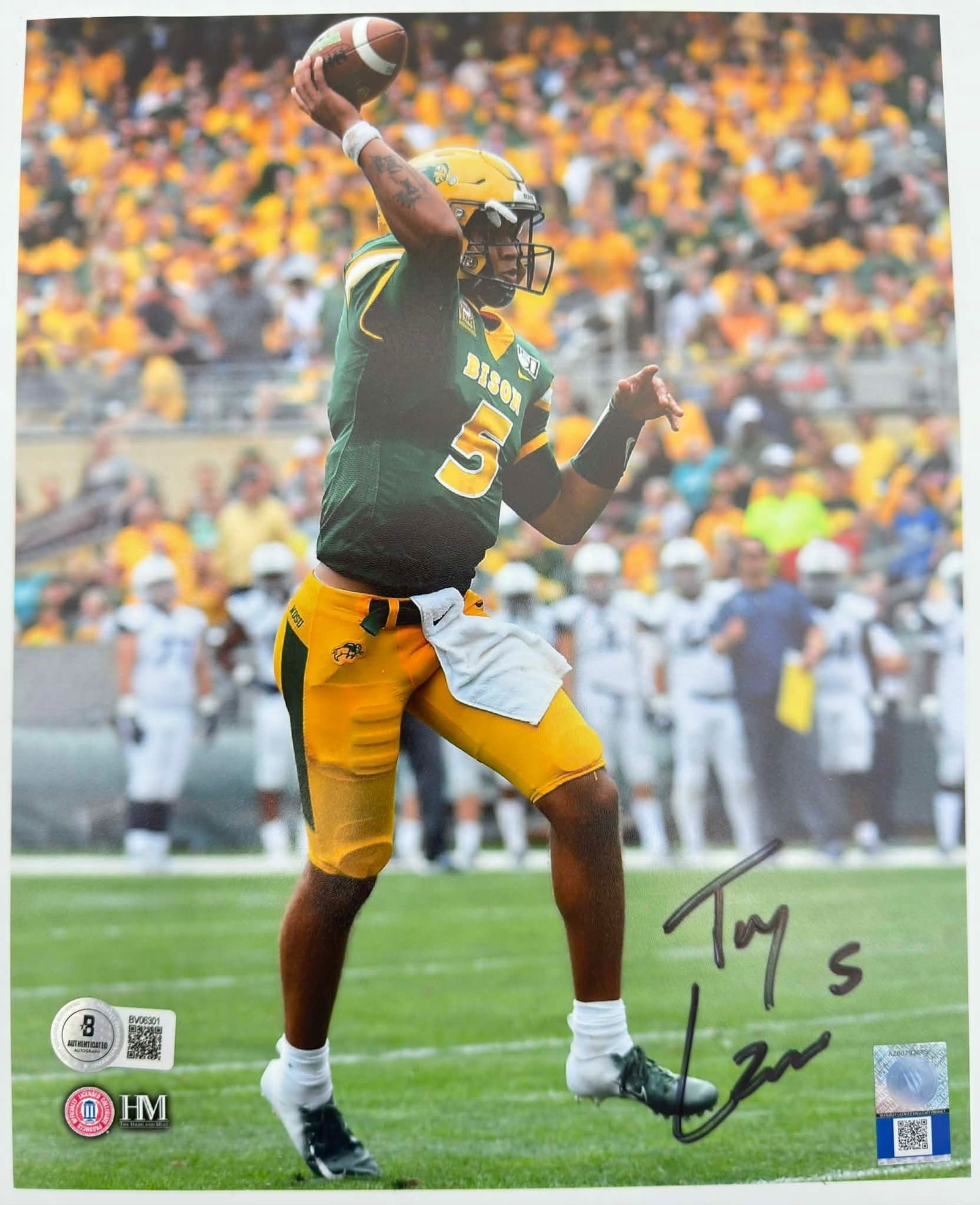 Trey Lance Signed Action Photograph – Beckett COA: Original color action photograph of Trey Lance, signed in black marker, depicting Lance in game action during his collegiate career. The autograph is authenticated by Beckett Authentication Services,