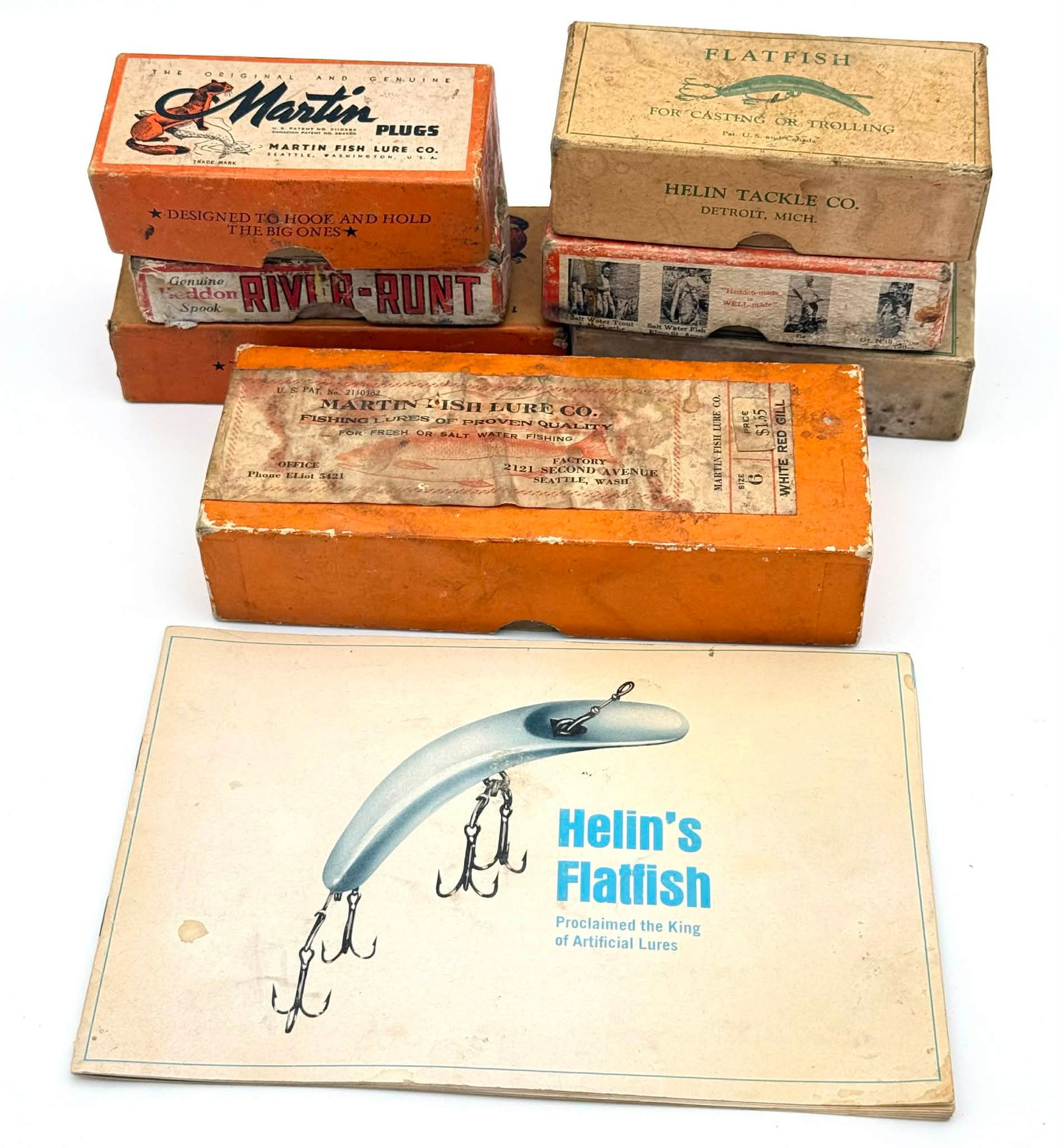 Vintage Fishing Lure Lot with Boxes – Martin Plugs, Helin Flatfish, Heddon River-Runt, and Other: Group lot of vintage fishing lures and original boxes including examples from Martin Fish Lure Co. (Seattle, Washington), Helin Tackle Co. (Detroit, Michigan), and Heddon River-Runt Spook. The lot inc