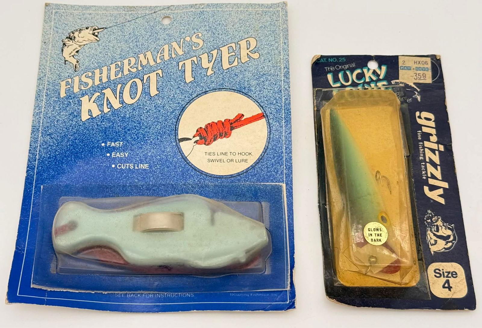Vintage Fishing Tackle Lot – Fisherman’s Knot Tyer Tool & Grizzly “Lucky Louie” Lure: Lot of two vintage fishing tackle items including a Fisherman’s Knot Tyer tool and a packaged Grizzly “Lucky Louie” fishing lure. Both pieces retain their original retail packaging. The Fish
