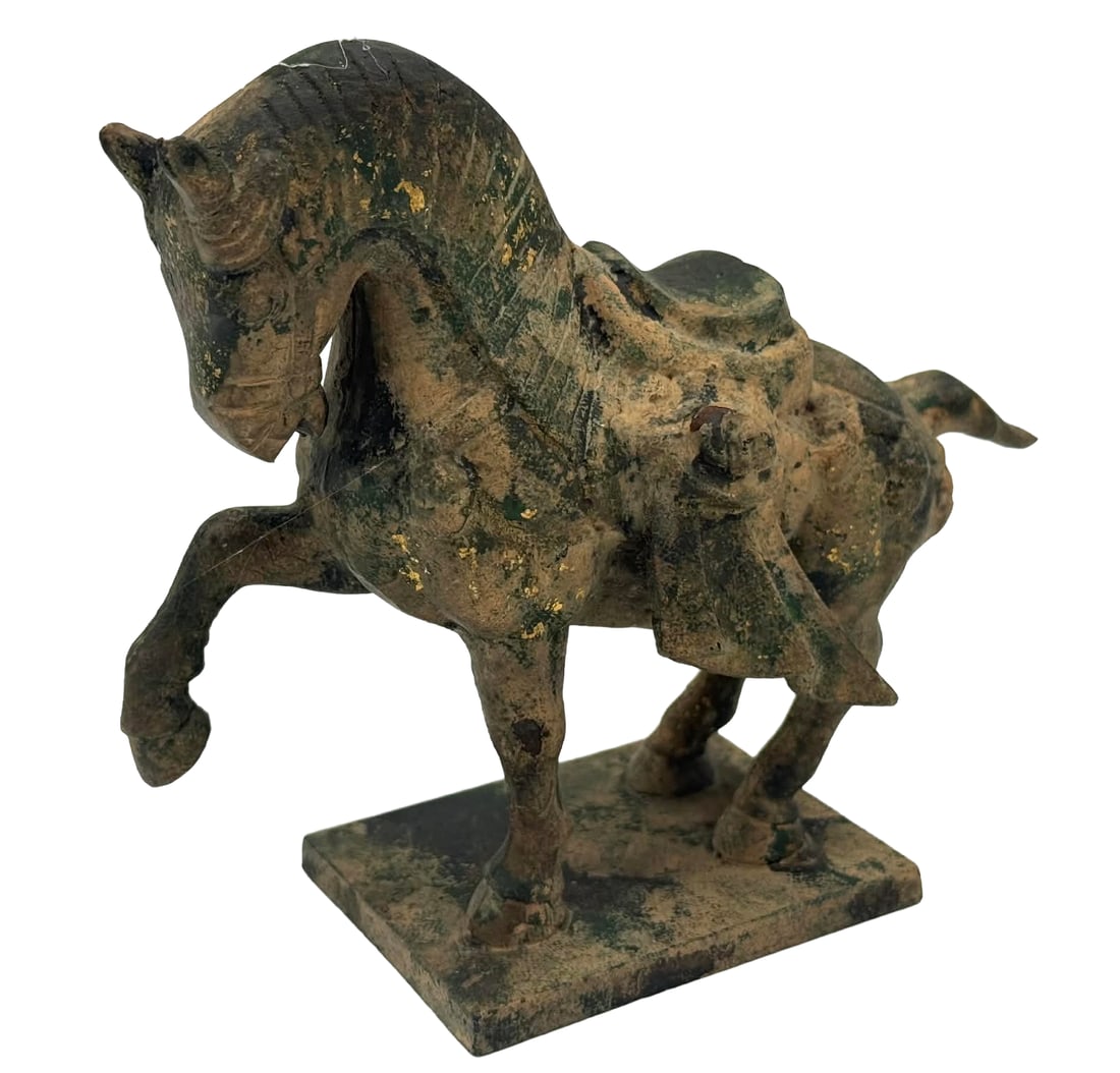 Antique Cast Metal Horse Figure on Plinth Base, Late 19th / Early 20th Century: Overview Antique cast metal horse figure dating to the late 19th or early 20th century, depicting a saddled horse in a raised-leg stance mounted on an integral rectangular plinth base. Construction Th