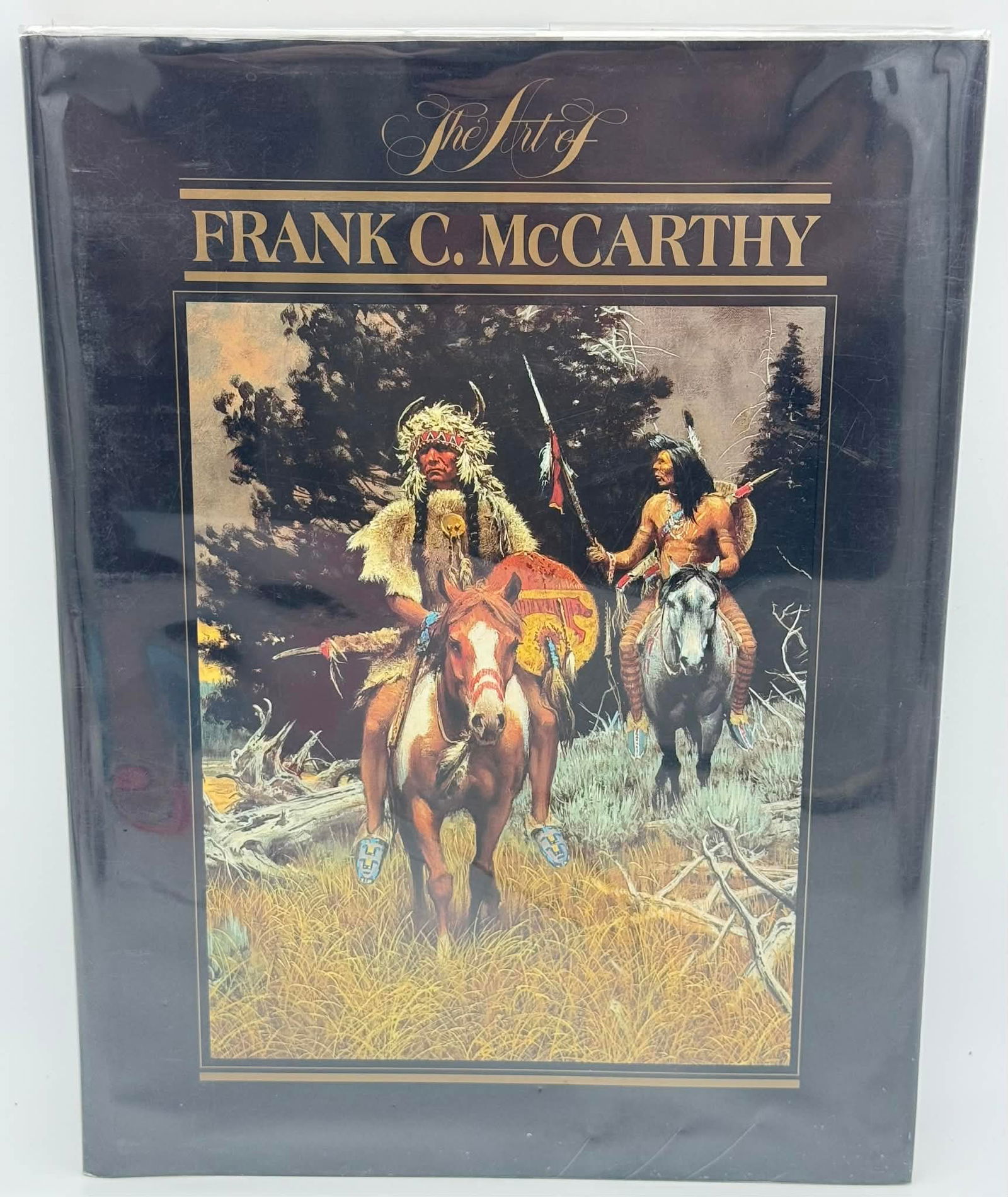 The Art of Frank C. McCarthy (1992) First Edition Western Art Monograph: Large-format first edition of The Art of Frank C. McCarthy, featuring dramatic Western paintings by renowned American artist Frank C. McCarthy with accompanying text by Elmer Kelton. Published in 1992