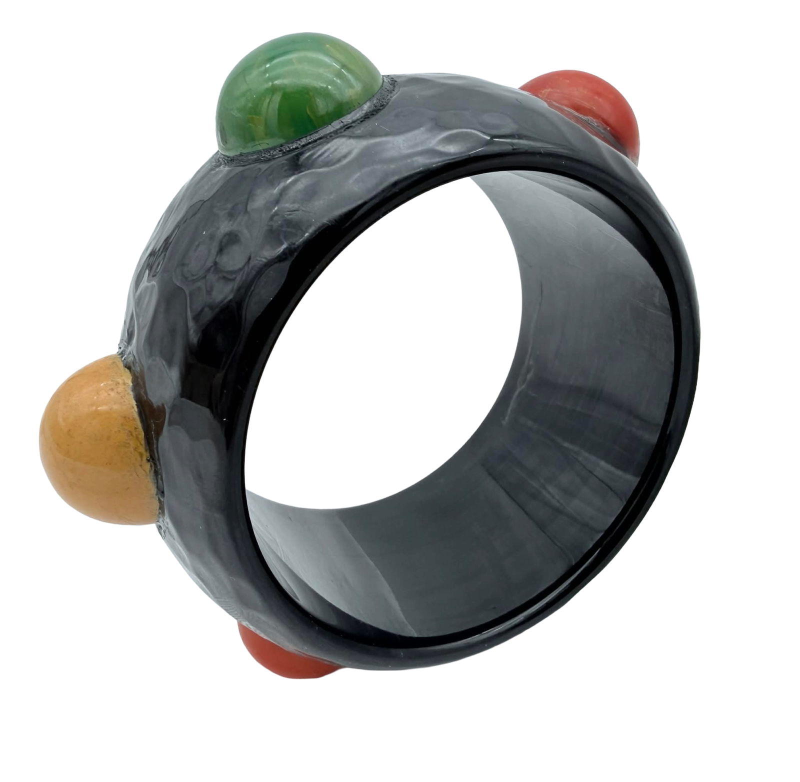 Vintage Bakelite Bangle Bracelet with Applied Polychrome Dot Motifs, Wide Form – New York Studio: Vintage Bakelite bangle bracelet featuring a bold sculptural design with applied domed polychrome elements in butterscotch, red, and green set against a marbled black ground. The bracelet’s wide for