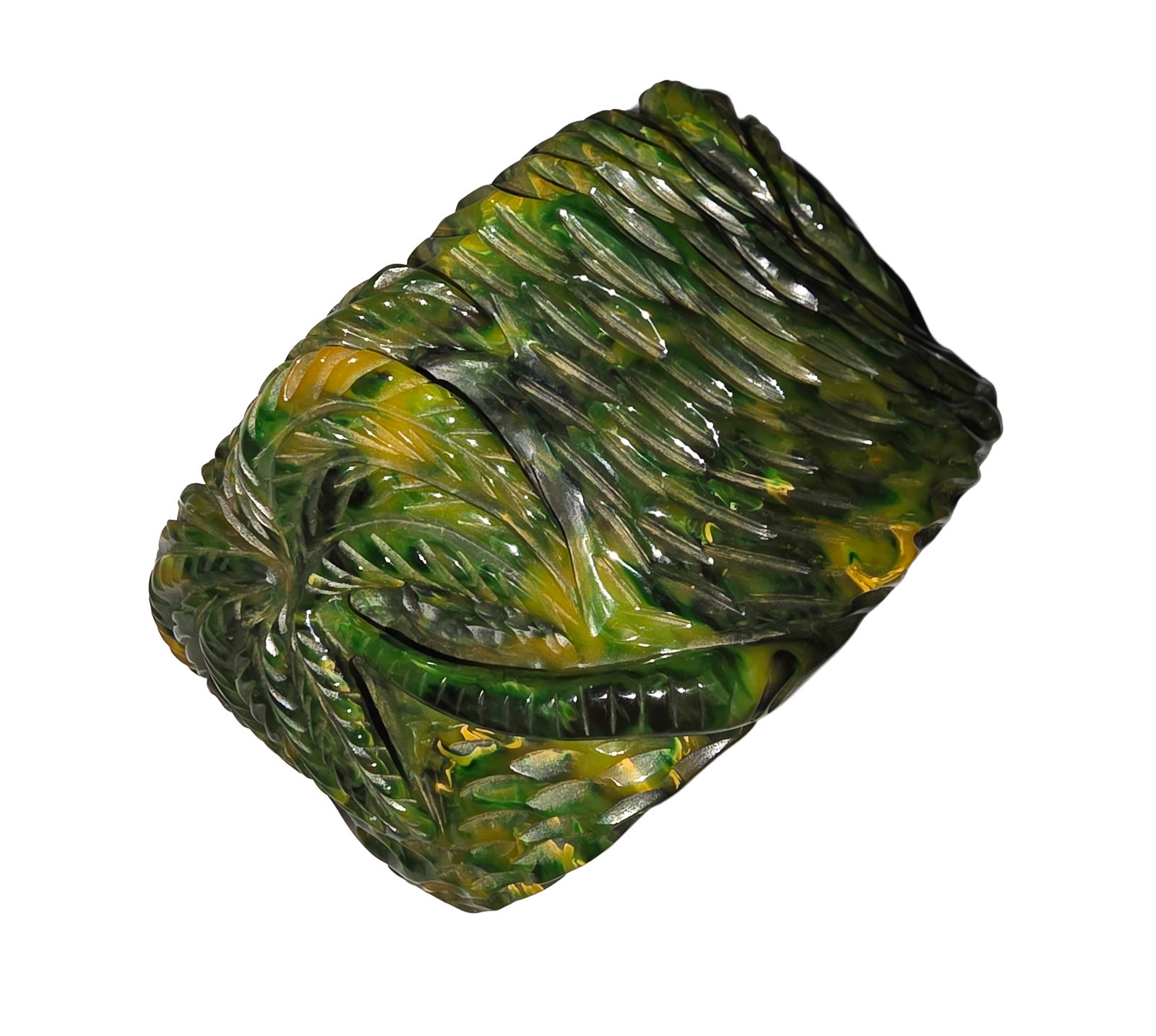 Rare Green “Jade” Bakelite Bangle Bracelet, Attributed Andy Warhol Collection, c. 1933: A rare, striking and substantial carved Bakelite bangle bracelet, rendered in a rich mottled green and yellow palette evocative of natural jade. The bracelet features deep, high-relief carving with st