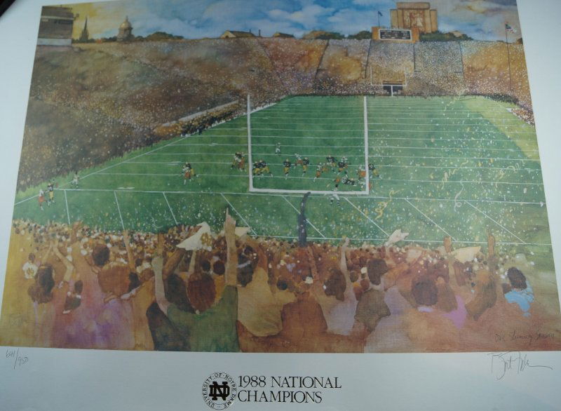 Norte Dame Football National Champion Lithograph Poster: Very hard to find Limited 1988 Notre Dame World Champions Poster, dated 1988. This poster is signed in pencil by artist Bart Forbes and numbered 641 out of 950 ever made. Official Notre Dame seal alon
