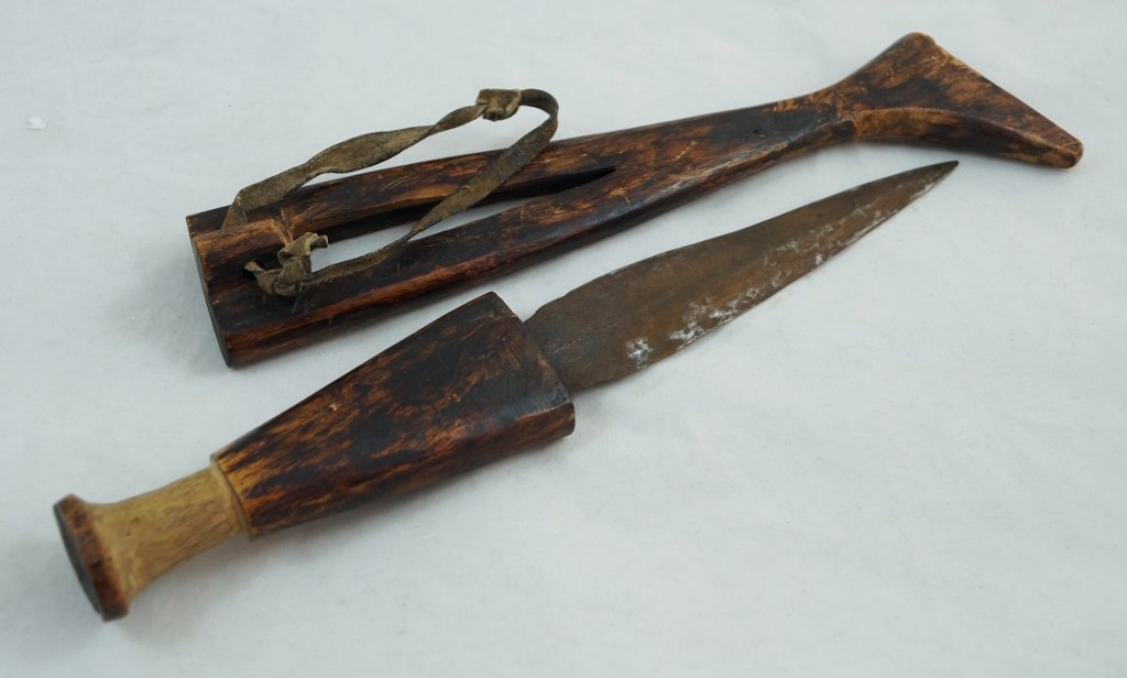 1875 Wood Antique African Knife Sacrificial Hand Forged: This is a RARE, hand forged, knife with wodden scabbard originating from Africa. Dated c.1875. This exact knife and scabbard was appraised by the Antiques Roadshow TV crew and was authenticated. They 