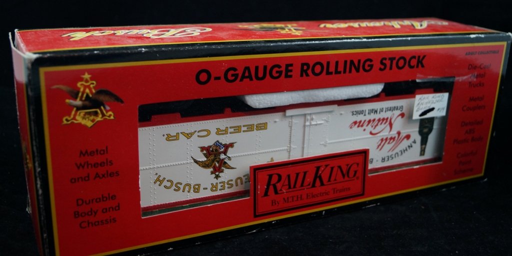 Anheuser Busch Rail King O-Gauge Rolling Stock Train: Contemporary Anheuser Busch Rail King O-Gauge Rolling Stock Train in original box. Die-Cast metal, colorful paint scheme and more. Box is 14" long.