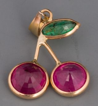 14K RUBY & EMERALD CHERRY PENDANT: 14K RUBY & EMERALD CHERRY PENDANT Yellow gold cherry pendant. 2 - 1.5ct each ruby cherries hang from a 0.33ct emerald leaf by 14k gold stems. Weight: 0.8G Size: 1in