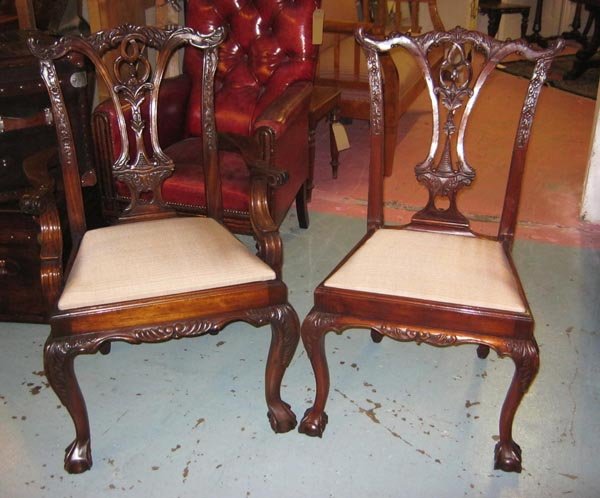 DINING CHAIRS, a set of twelve, mahogany, after a: DINING CHAIRS, a set of twelve, mahogany, after a design by Thomas Chippendale, including two armchairs. (12)
