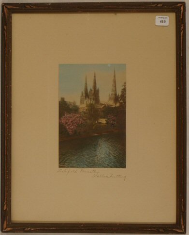 Wallace Nutting - Litchfield Minster: Circa 1915-25 Wallace Nutting hand-colored photo. Cathedral spires beyond river and blossoms. England. Original mat and pen signature. Est 12x14" frame with partial original backing paper. 4.0 Grading