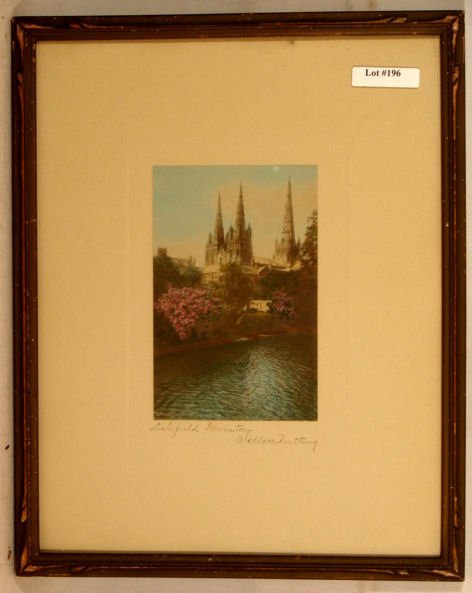 Wallace Nutting - Litchfield Minster: Circa 1915-25 hand-colored photo. Foreign scene with tall three-spired cathedral rising above a riplling tree-lined lake. England. Original mat, pen signature & title. Est 11x14" original frame with n