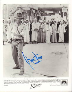 Harrison Ford: 8x10 B&W Raiders of the Lost Ark promotional photo signed by film's star