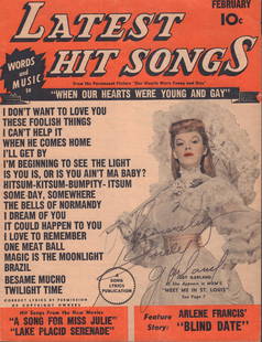 Judy Garland: 8.5x11 "Lastest Hit Songs" publication, signed the actress and singer, best known for her role in The Wizard of Oz