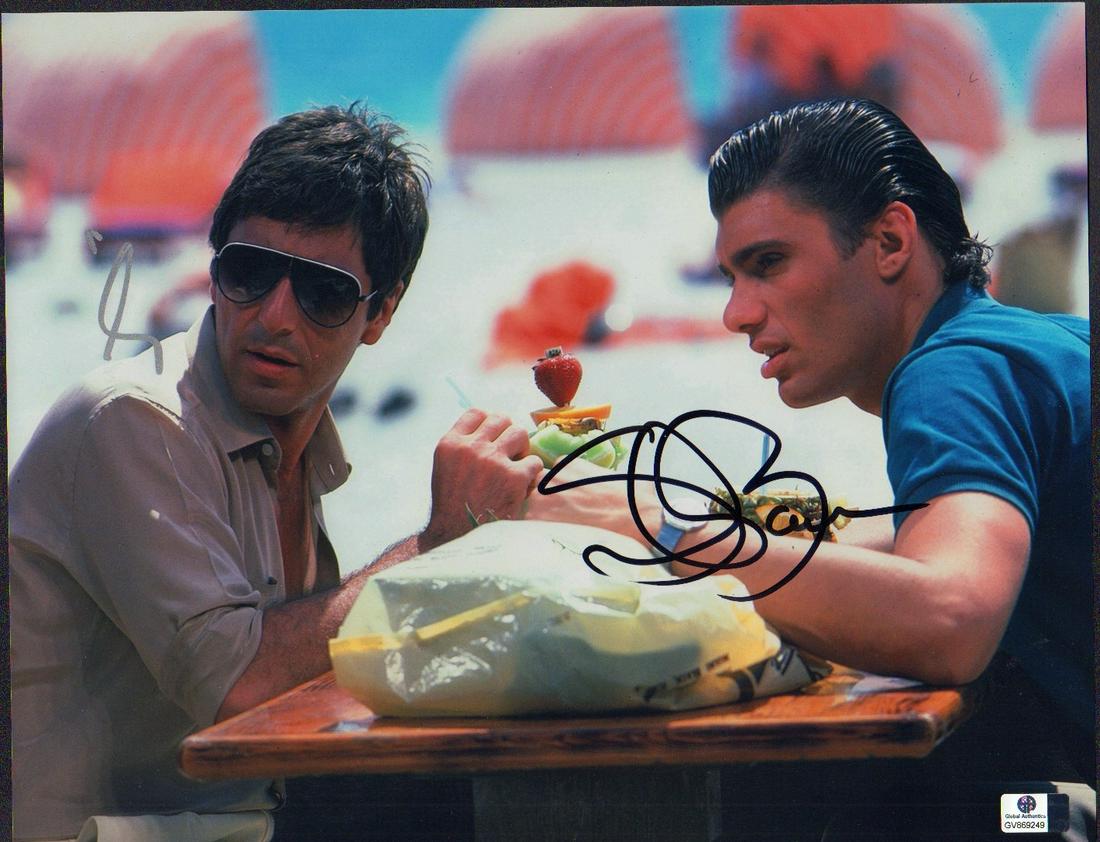 Scarface 11x14: A color 11x14 scene from the famous film signed by both stars Al Pacino and Steven Bauer with Global Authentics sticker on it