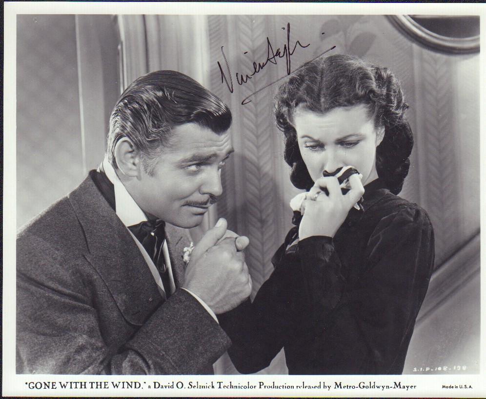 Vivien Leigh Gone with the Wind: An original GWTW rerelease still signed by Vivien Leigh as Scarlett O'Hara ! Nice museum quality ! POP COA