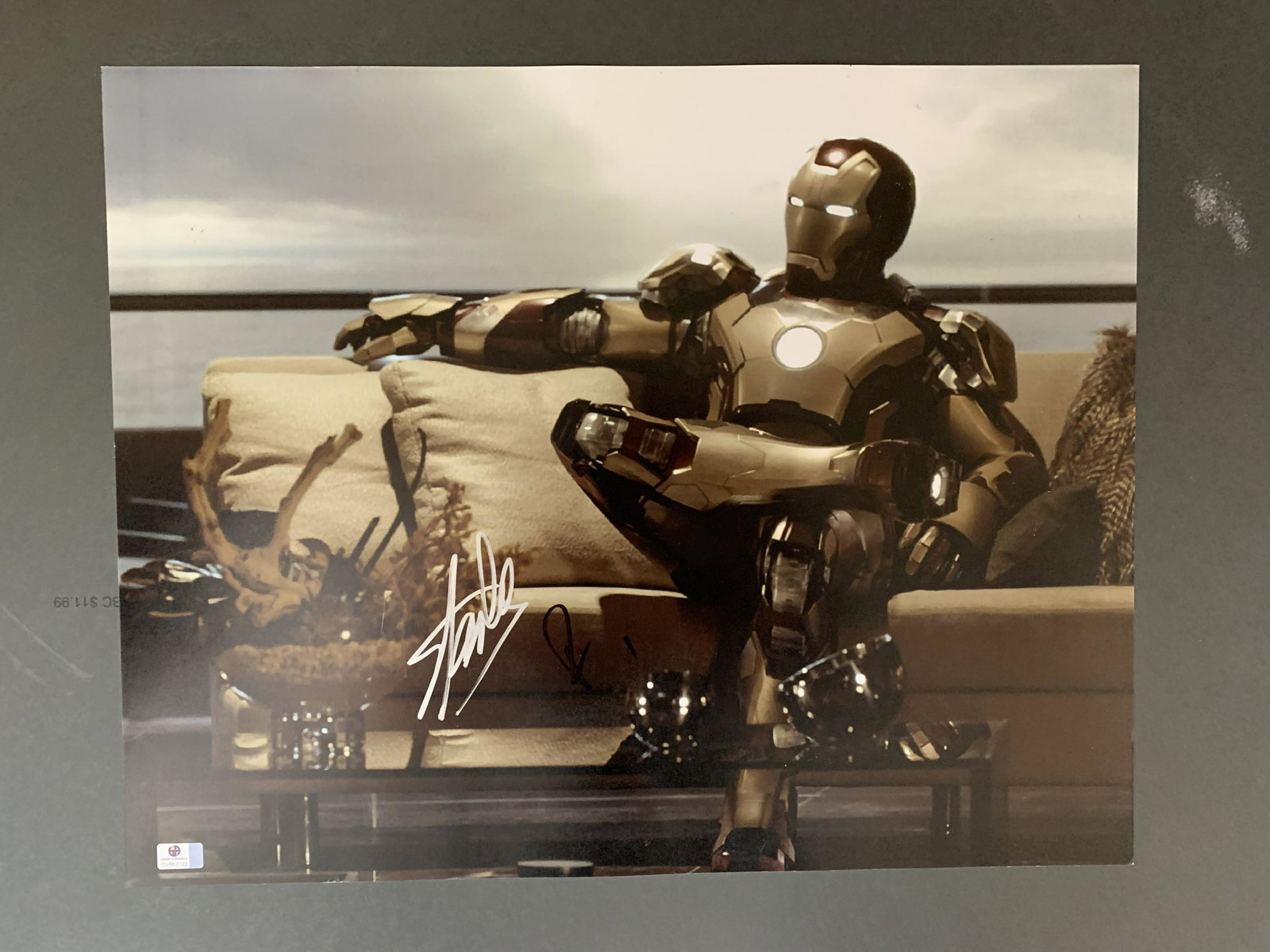 Iron Man and Stan Lee 16x20: A large signed image from the Iron Man film signe d by Robert Downey Jr AND creator Stan Lee with Global Authentics sticker on it as well !