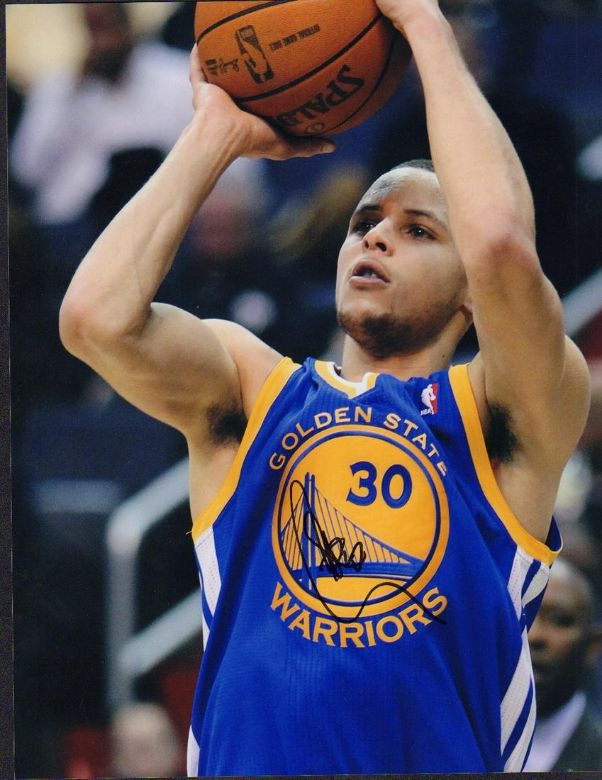 Stephen Curry 11x14: A wonderful at the net signed color larger 11x14 of the Warriors legend POP COA