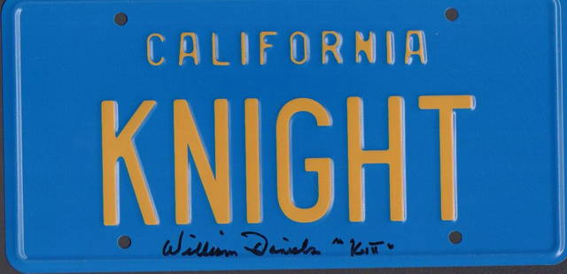 KITT Knight Rider License tag: A replica KITT Knight Rider series license tag signed by the voice of the car actor William Daniels with COA