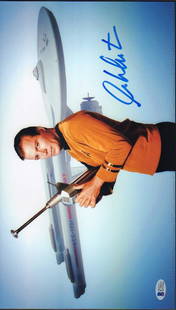 William Shatner Star Trek: A color 11x14 Star Trek as Capt Kirk signed image with Beckett Witnessed sticker and COA under a private signing with us