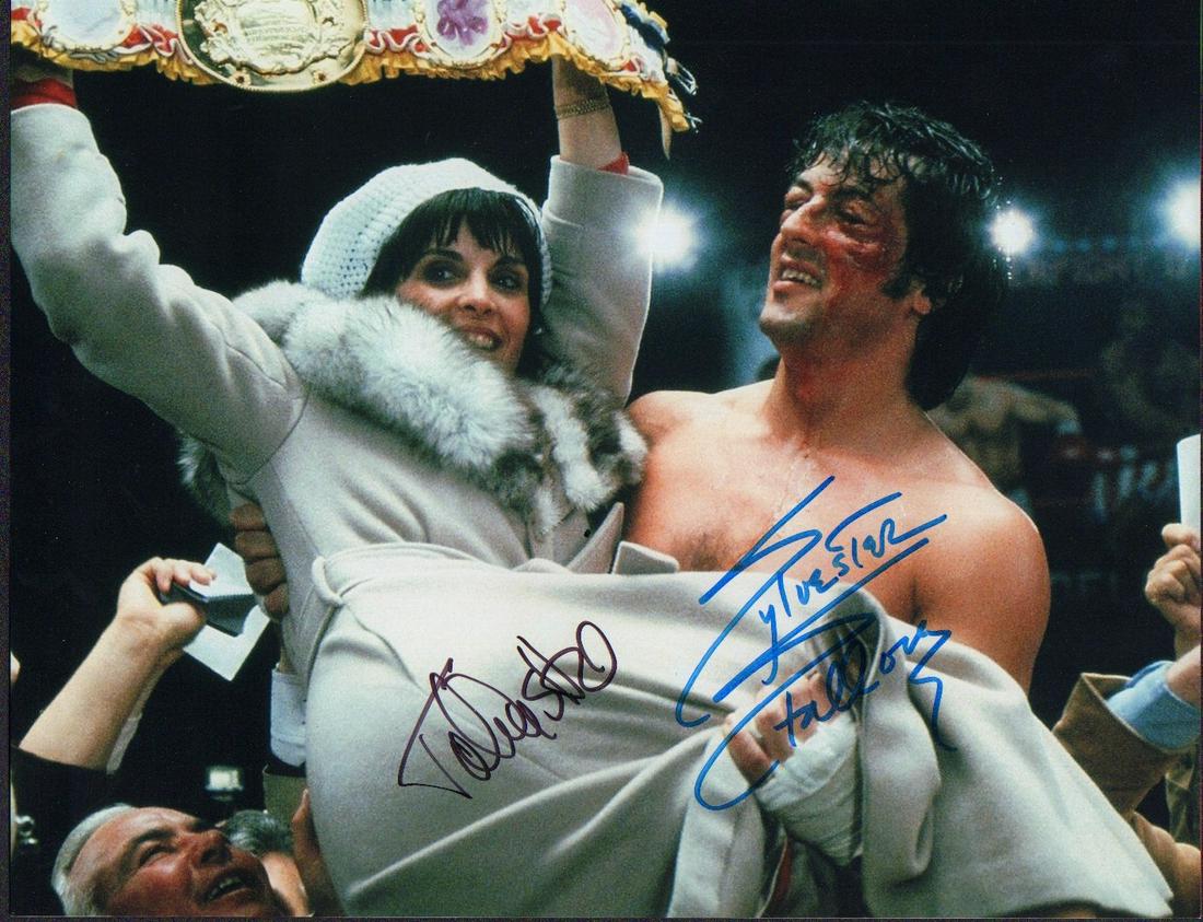 ROCKY Cast: A color 11x14 signed by Sylvester Stallone under private signing and later by Talie Shire in person from ROCKY with COA
