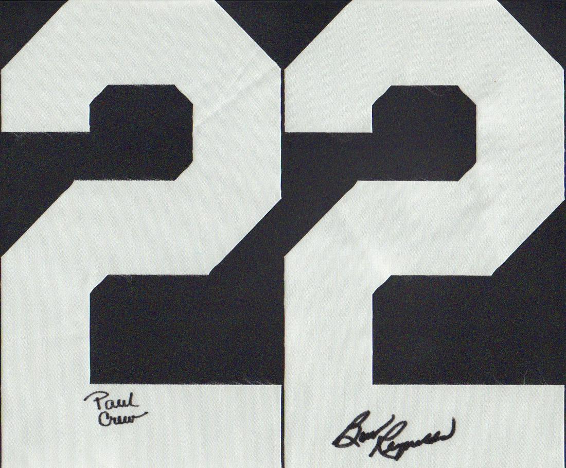 Burt Reynolds Longest Yard: A pair of numbers for a Longest Yard jersey signed Burt Reynolds on one and the characters name Paul Crewe on the other with COA
