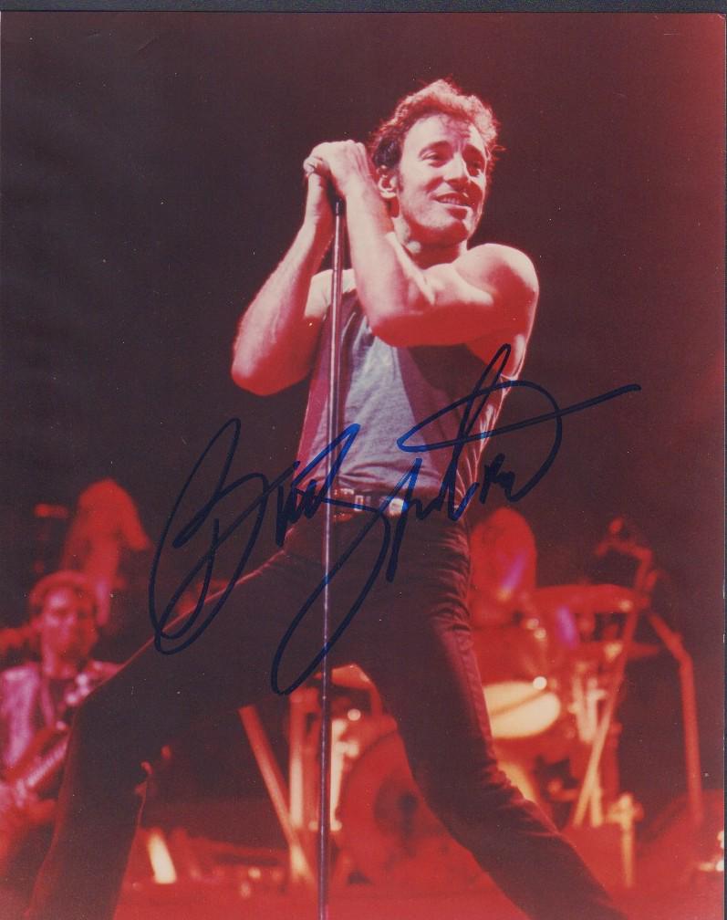 Bruce Springsteen: A color 80s stage shot signed by the BOSS himself with COA