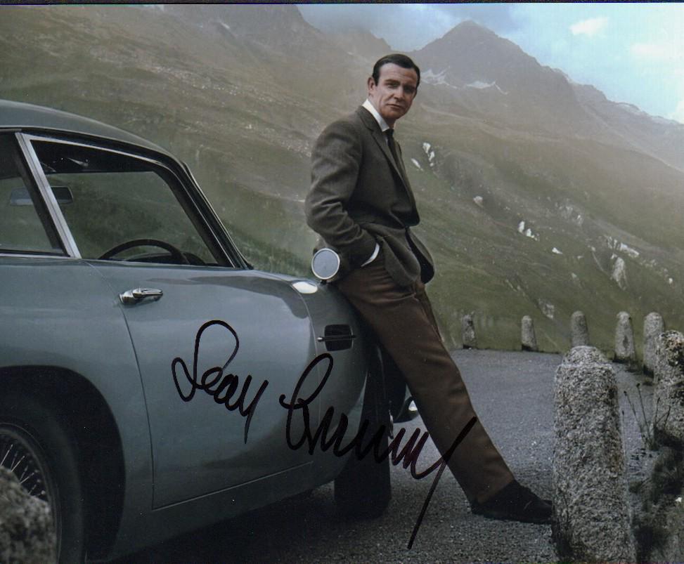 Sean Connery: A color James Bod 8x10 leaning on famed Aston Martin car with COA