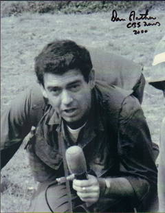 Dan Rather: a DATED Vietnam signed bw 8x10 of the legendary broadcaster signed with COA