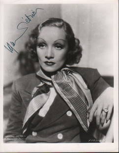 Marlene Dietrich signed photograph: A sultry posed bw 8x10 of the acting legend signed nicely with COA