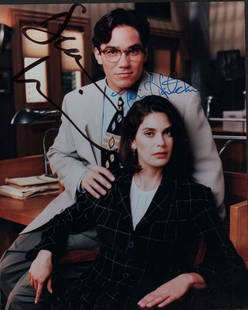 Lois and Clark signed photograph: A color cast signed 8x10 by Teri Hatcher and Dean Cain from the Superman series with COA