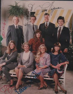 Dallas TV cast signed photograph: A vintage color signed 8x10 by the cast of TVs Dallas Larry Hagman Victoria Principal Patrick Duffy Linda Gray Barbara Bel Geddes Charlene Tilton and more with COA